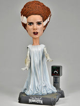 Load image into Gallery viewer, front of figure on display