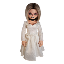 Load image into Gallery viewer, Doll is clothed with a white long sleeve wedding dress and black choker accessory. Has tattoo on right breast of a red heart with a dagger stabbed in it and the text "chucky" above the heart.
