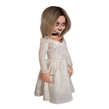 Load image into Gallery viewer, Doll is clothed with a white long sleeve wedding dress and black choker accessory. Has tattoo on right breast of a red heart with a dagger stabbed in it and the text "chucky" above the heart.