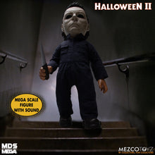 Load image into Gallery viewer, Doll wears tailored, weathered coveralls, features 11 points of articulation, and comes complete with a butcher knife accessory that fits neatly in his right hand.
