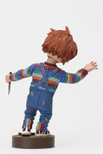 Load image into Gallery viewer, back of Head knocker bobble head of Chucky from Child&#39;s Play 2. Chucky has his right hand up, mouth open as if he is yelling, and in his left hand is clutching a knife. Chucky stands on a small round platform that reads &quot;CHUCKY&quot; in red letters on the front.
