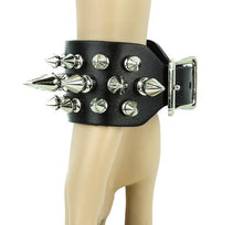Load image into Gallery viewer, Black leather bracelet with three rows of silver spikes. Top and bottom row consist of 1/2" silver spikes. Center row consists of 1" silver spikes.