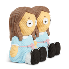 Load image into Gallery viewer, side of figure on display
