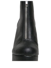 Load image into Gallery viewer, front view of black vegan leather sleek 6.5" heel boot with silver front zip. Bottom of boot has a fanned front grip for better stability when walking.