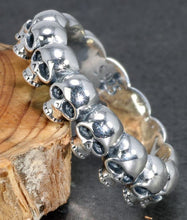 Load image into Gallery viewer, 925 Sterling silver band ring with multi-skull design.