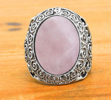 Load image into Gallery viewer, front of Silver colored ring with oval natural pink quartz stone.