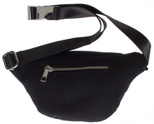 Load image into Gallery viewer, back view of Black canvas fanny pack features a durable canvas body accented by stud detailing. Zip closure, with interior and exterior zippered pockets, and an adjustable nylon strap with metal buckle. Fanny pack has additional front zipper pocket, and additional back zipper pocket.