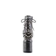 Load image into Gallery viewer, front view of black vegan leather 5 1/2" heel 3" platform Lace-up front Ankle boot Features wrap around buckled straps with spikes & eyelets and heart O-ring on vamp with Inside zip closure