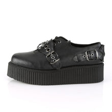 Load image into Gallery viewer, left side view of black vegan leather 2 inch platform creeper with O ring design on the front and adjustable straps on both sides of front of shoe, with hidden lace up underneath and bat ring adjustable strap on outside of shoe. has secret hidden coffin shaped compartment underneath sole cover inside shoe