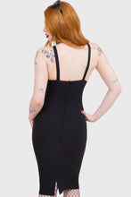 Load image into Gallery viewer, Model wearing a black dress with cut-out pentagram design on a white background
