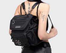 Load image into Gallery viewer, model wearing a black backpack and black skirt on a white background
