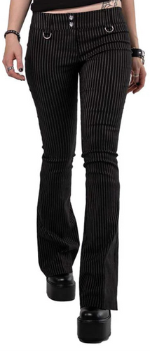 Model wearing black and white pinstripe pants on a white background