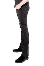 Load image into Gallery viewer, Model wearing black and white pinstripe pants worn n a white background
