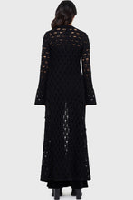 Load image into Gallery viewer, Model wearing a black floor length cardigan on a white background
