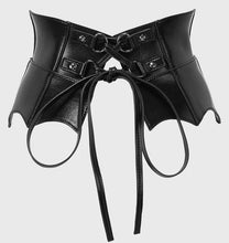Load image into Gallery viewer, Black vegan leather corset belt with decorative elements on a light gray background
