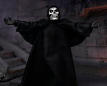 Load image into Gallery viewer, Figure in a black robe with a skull mask standing in a dark, eerie setting.
