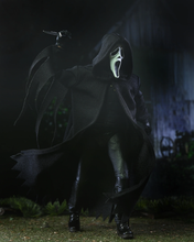 Load image into Gallery viewer, Toy in a dark costume with a mask in a dark, eerie setting
