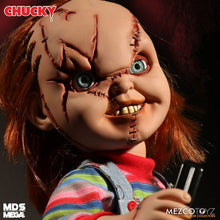Load image into Gallery viewer, Close-up of a Chucky doll with red hair and striped shirt, holding a knife, against a dark background.
