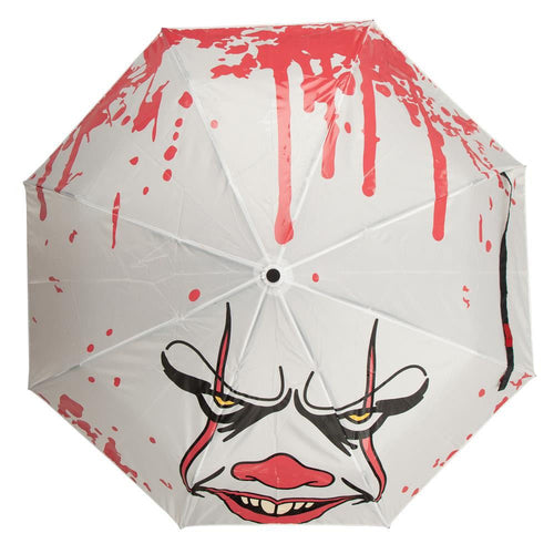 White umbrella with Pennywise IT clown face screen printed on it. Color changing art when wet.
