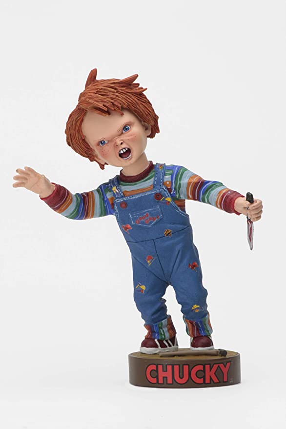 front of Head knocker bobble head of Chucky from Child's Play 2. Chucky has his right hand up, mouth open as if he is yelling, and in his left hand is clutching a knife. Chucky stands on a small round platform that reads 
