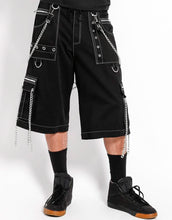 Load image into Gallery viewer, front view of Black baggy Tripp pants with pant legs zipped off into shorts.
