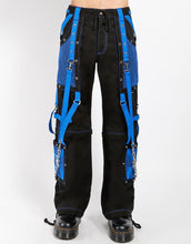 Load image into Gallery viewer, front of Black and blue studded pants zip off into shorts and feature removable chains, adjustable ankles, zippers, D-rings, and deep pockets.
