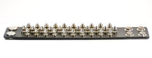 Load image into Gallery viewer, black leather bracelet with three rows of multiple silver spikes. shows snap closure
