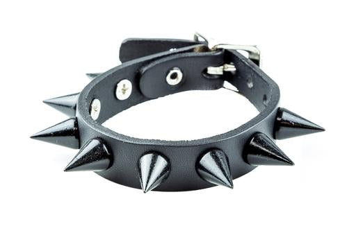 Black leather bracelet with single row black cone spikes.