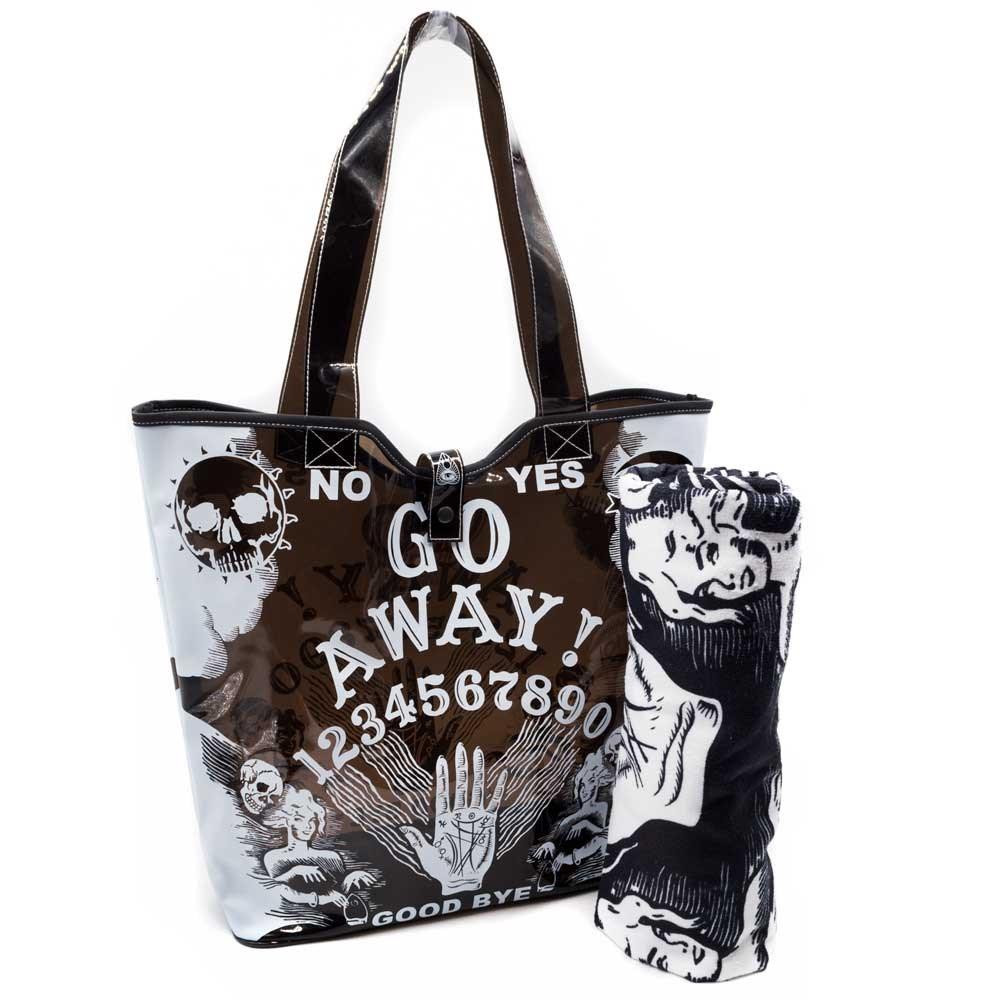 See-through black PVC beach tote. Bag has white Ouija board 