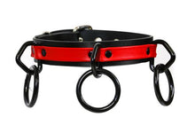Load image into Gallery viewer, Black and red leather collar with three black D rings and hanging black O rings.
