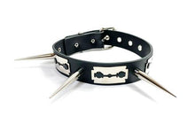 Load image into Gallery viewer, Black leather collar with three silver fake razorblades and three needle spike details.
