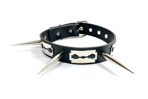 Black leather collar with three silver fake razorblades and three needle spike details.