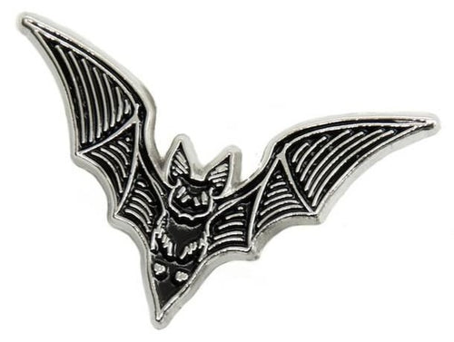 Silver bat shaped pin with black enamel details painted in.