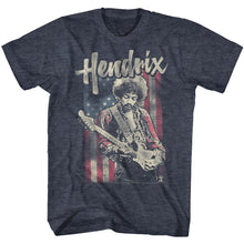 Load image into Gallery viewer, navy heather blue jimi hendrix shirt with &quot;hendrix&quot; logo and picture of jimi playing guitar in front of vertical american flag graphic
