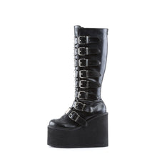 Load image into Gallery viewer, outer side view of black vegan leather 5 1/2&quot; wedge platform Goth punk gogo knee high boot Adjustable straps from top to bottom of boot, with metal plates up the front with full back zipper
