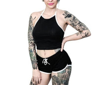 Load image into Gallery viewer, women&#39;s Black shorts with white trim and white heart designs on both buttcheeks. left heart says &quot;fuck off&quot; and right heart says &quot;fuck you.&quot; with white drawstring
