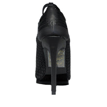 Load image into Gallery viewer, back side view of 6&quot; heel sandal with adjustable ankle strap and woven nylon upper and sides with vegan leather details.

