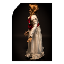 Load image into Gallery viewer, doll wearing white long sleeve dress with red carnation accessory belt. doll is holding parchment paper that reads &quot;miss me?&quot;
