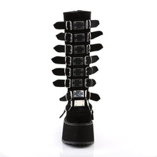 Load image into Gallery viewer, front side view of black vegan velvet suede 3.5&quot; platform knee high boot Features 8 buckle straps w/ metal plates at center and back metal zip closure
