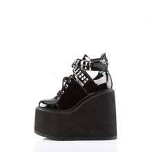 Load image into Gallery viewer, inner side view of black vinyl 5.5&quot; wedge platform Mary Jane style Lace-up front Wrap around style studded adjustable strap around ankle
