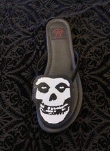 Load image into Gallery viewer, top of Black flat sandal with vegan leather Misfits fiend skull cutout on top. Vegan leather with black rubber outsole.
