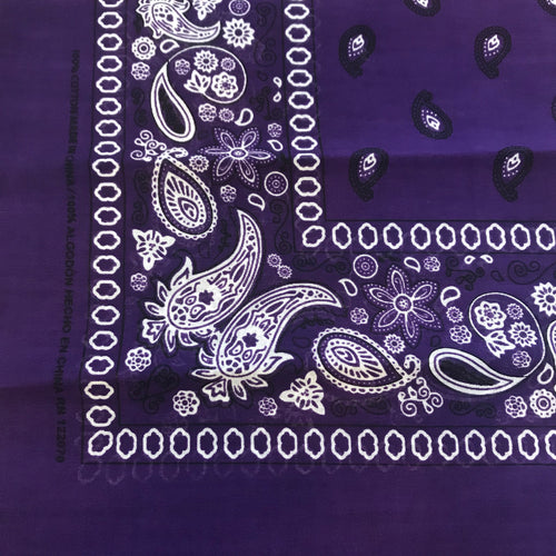 Purple bandana with white and black paisley print.
