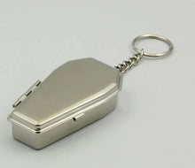 Load image into Gallery viewer, front top view of silver coffin shaped ashtray on hanging short chain keychain. Coffin opens and turns into an ashtray
