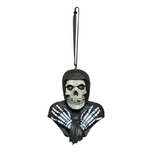 Load image into Gallery viewer, classic misfits fiend white skeleton bust with black hood and skeleton hands crossed on chest. has attached black ribbon for hanging
