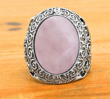 Load image into Gallery viewer, front of Silver colored ring with oval natural pink quartz stone.
