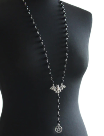 necklace on mannequin