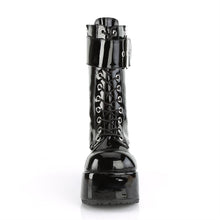 Load image into Gallery viewer, front view of Black patent vinyl 3 1/2&quot; platform lace-up mid-calf boot with ornamental inner and outer zipper details, oversized buckle strap and back zip closure.
