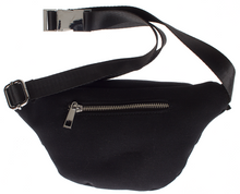 Load image into Gallery viewer, back view of Black canvas fanny pack features a durable canvas body accented by stud detailing. Zip closure, with interior and exterior zippered pockets, and an adjustable nylon strap with metal buckle. Fanny pack has additional front zipper pocket, and additional back zipper pocket.
