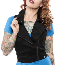 Load image into Gallery viewer, front view of Black vest. Vest has the same shape and design as a moto jacket, with a zip up front and black studs around the collar.
