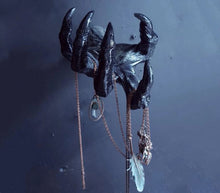 Load image into Gallery viewer, front view of Black witch hand statue with necklaces hanging from the fingers

